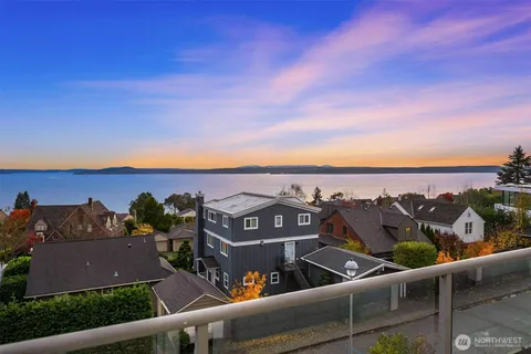 a view of a city with an ocean view