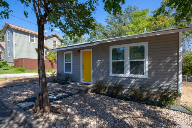 1183 Coleto Street Austin, TX 78702 - Photo 2 of 17 a front view of a house with garden