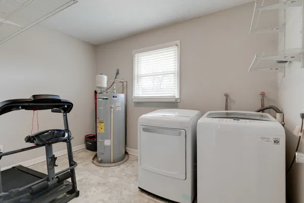 a utility room with dryer and washer