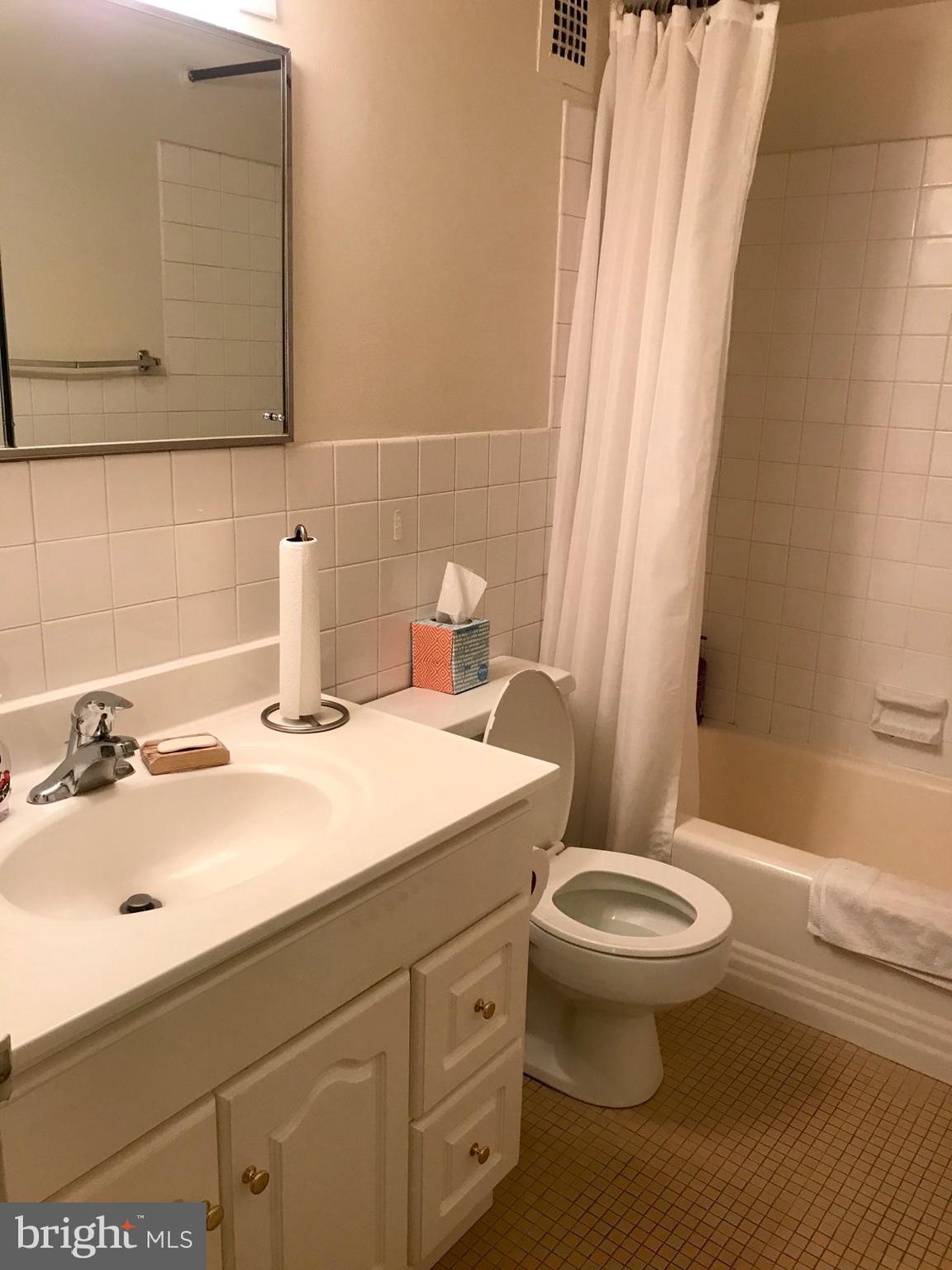 226 West Rittenhouse Square, Unit 307 Philadelphia, PA 19103 - Photo 8 of 18 a bathroom with a sink and a toilet