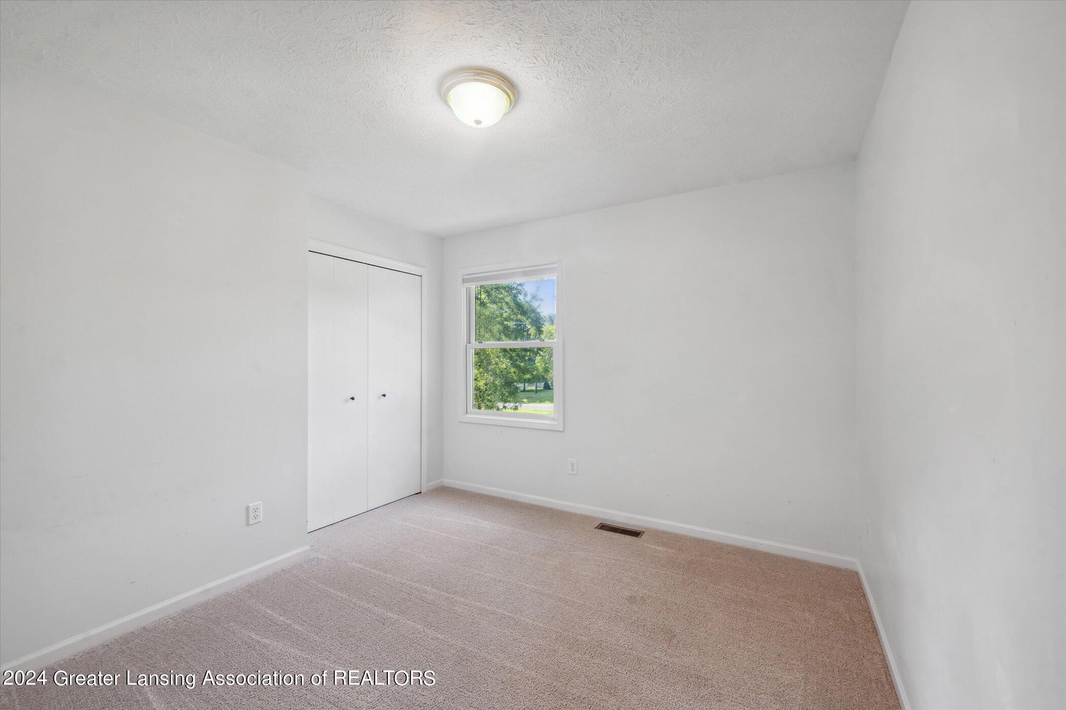 174 Newman Road Okemos, MI 48864 - Photo 34 of 54 27-174-Newman-Rd-Okemos-MI-48864-WindowS