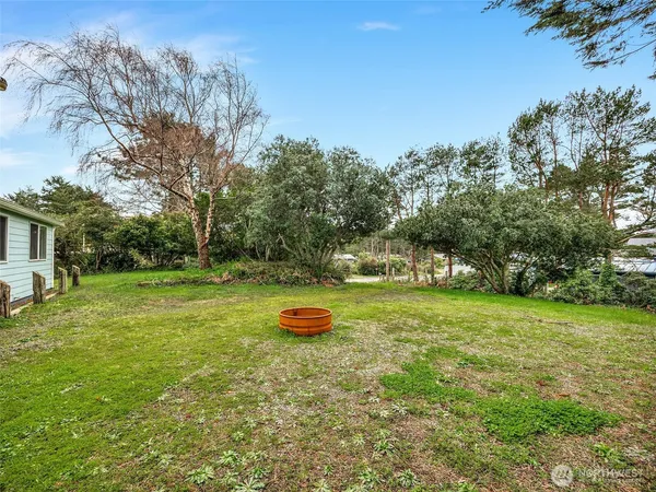 a view of a yard with a slide