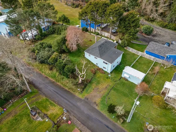 an aerial view of a house with a garden