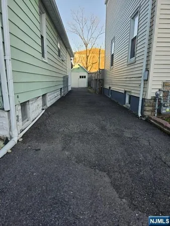 a view of a house with a back yard