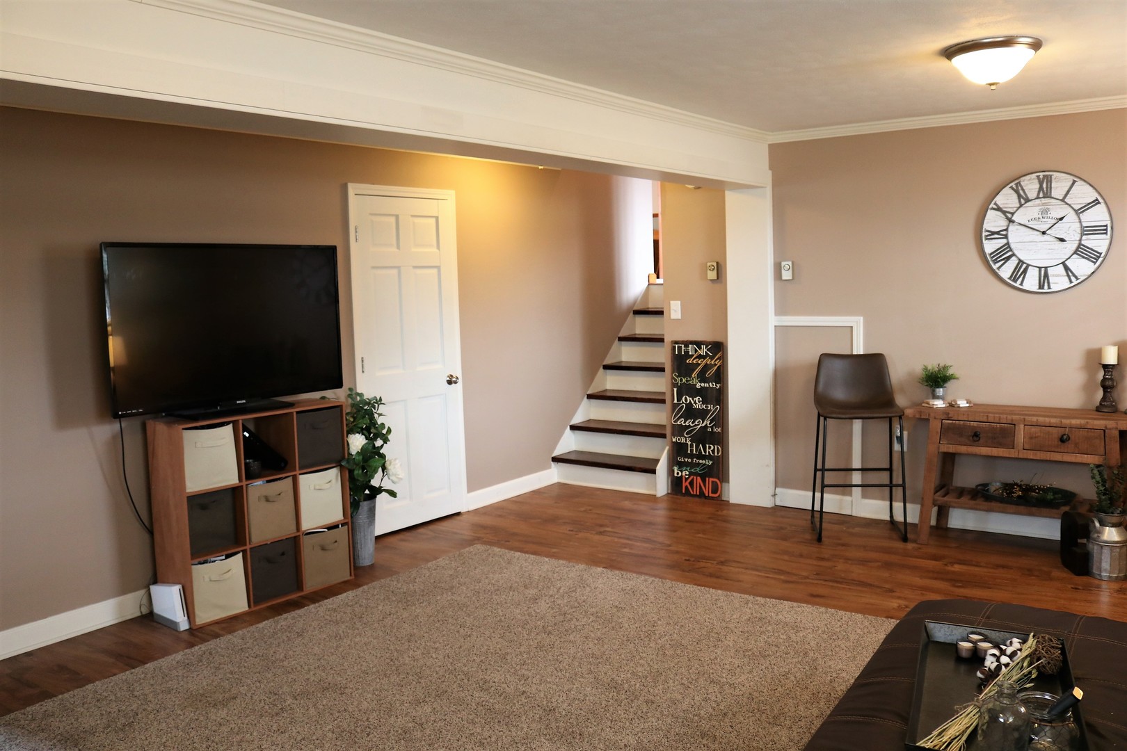 10167 Rich Road DeKalb, IL 60115 - Photo 23 of 31 a living room with furniture and a flat screen tv