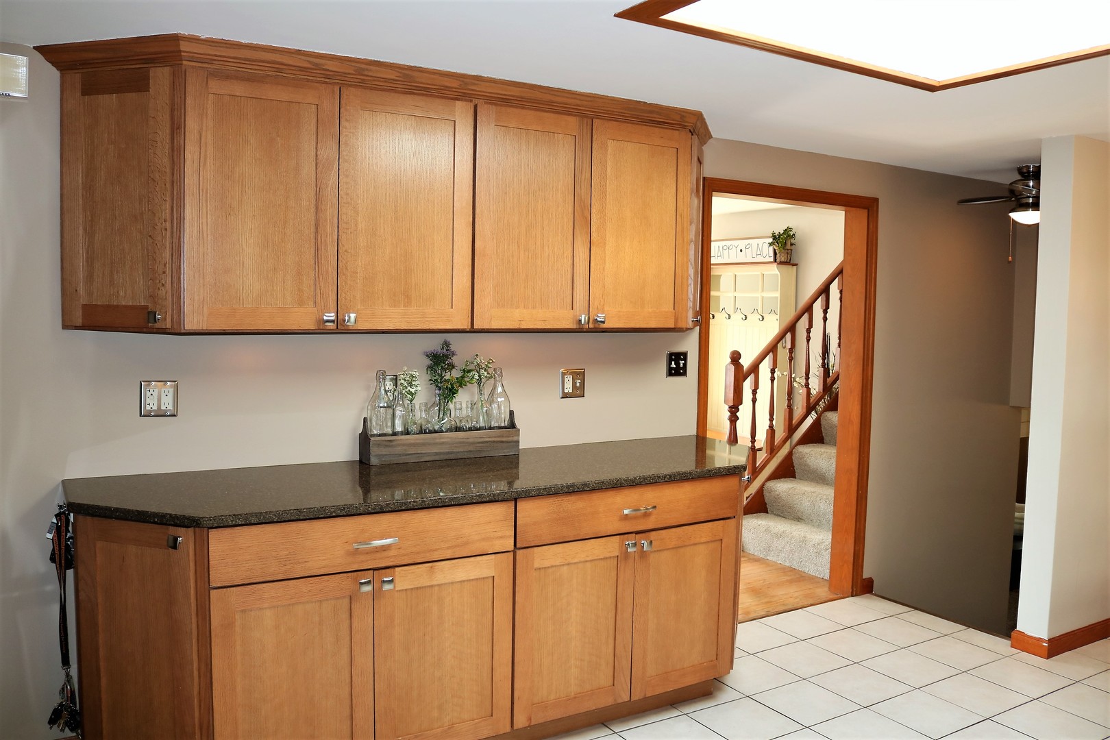 10167 Rich Road DeKalb, IL 60115 - Photo 8 of 31 a kitchen with stainless steel appliances granite countertop white cabinets sink and a granite counter top