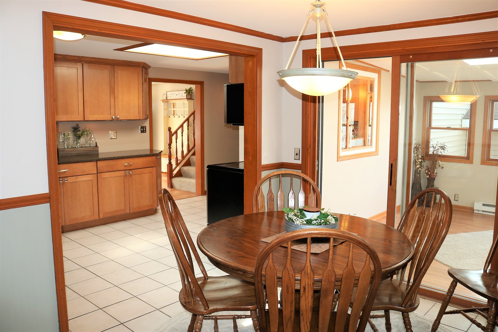 10167 Rich Road DeKalb, IL 60115 - Photo 9 of 31 a dining room with furniture and window
