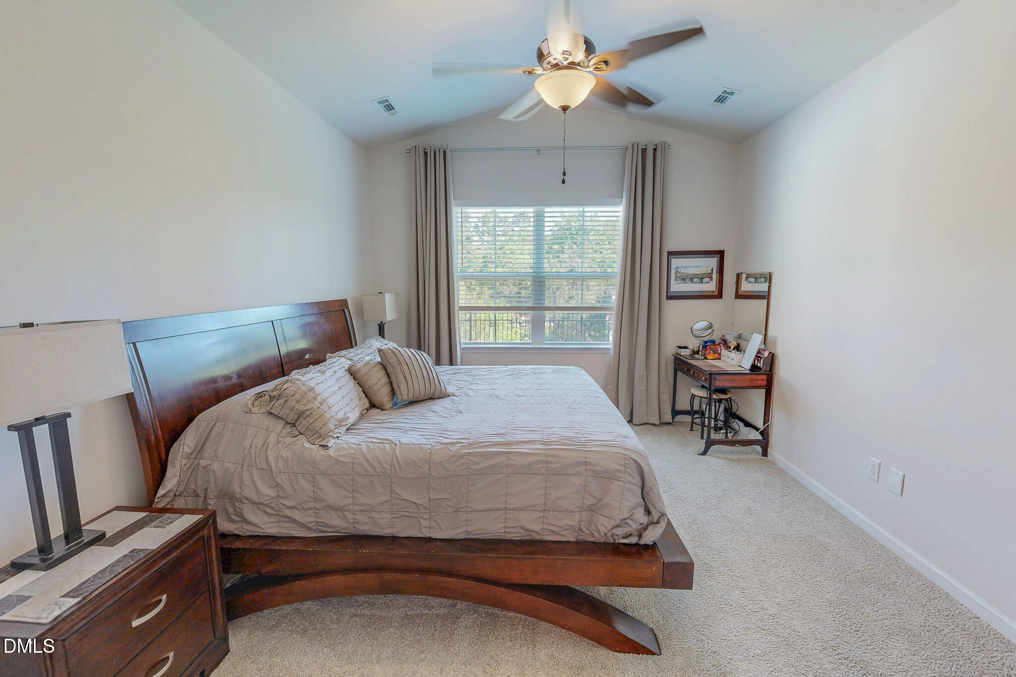 1017 Broadlands Way Graham, NC 27253 - Photo 16 of 32 a bedroom with a bed and a window