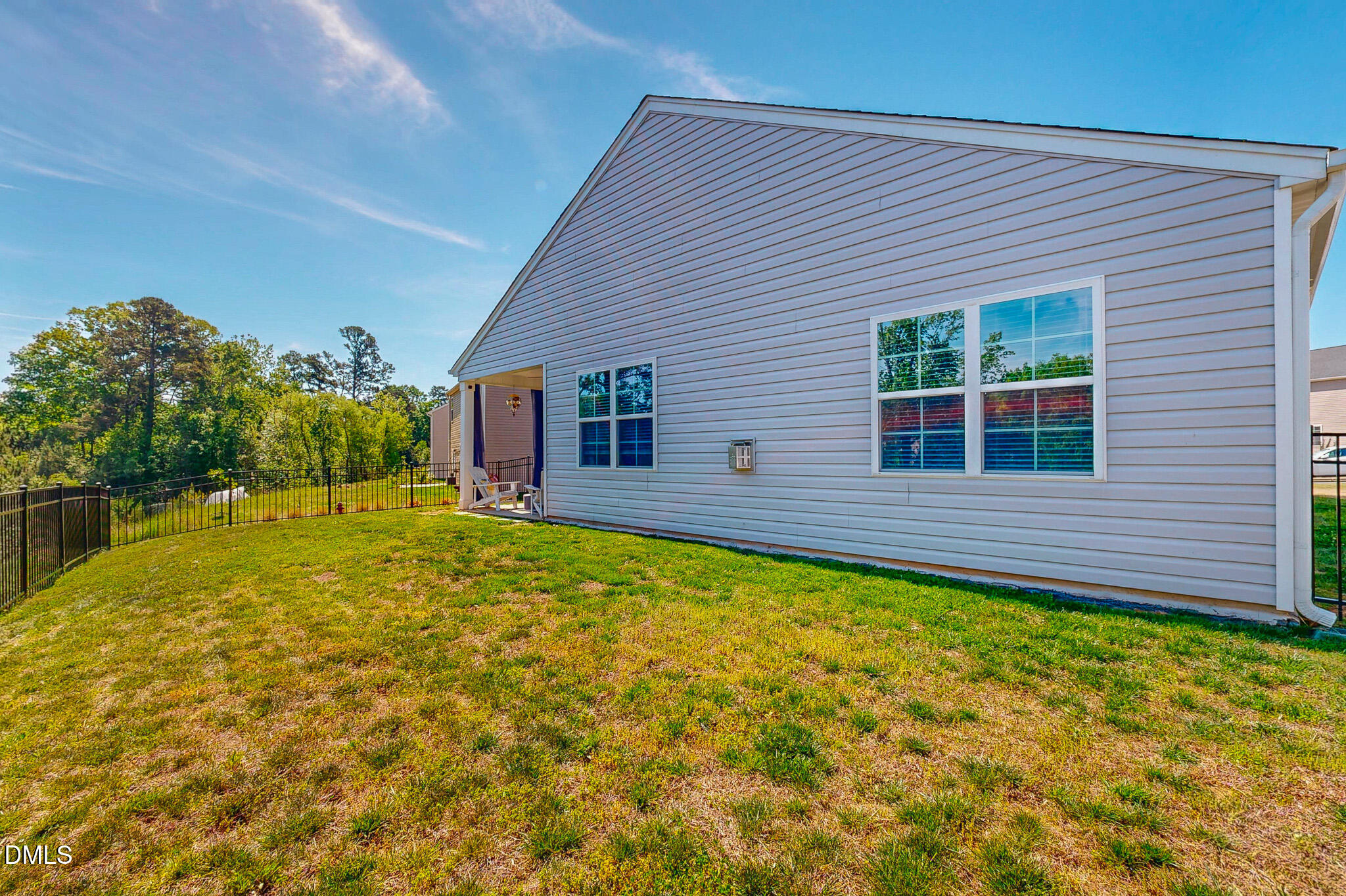 1017 Broadlands Way Graham, NC 27253 - Photo 19 of 32 a view of a house with a backyard