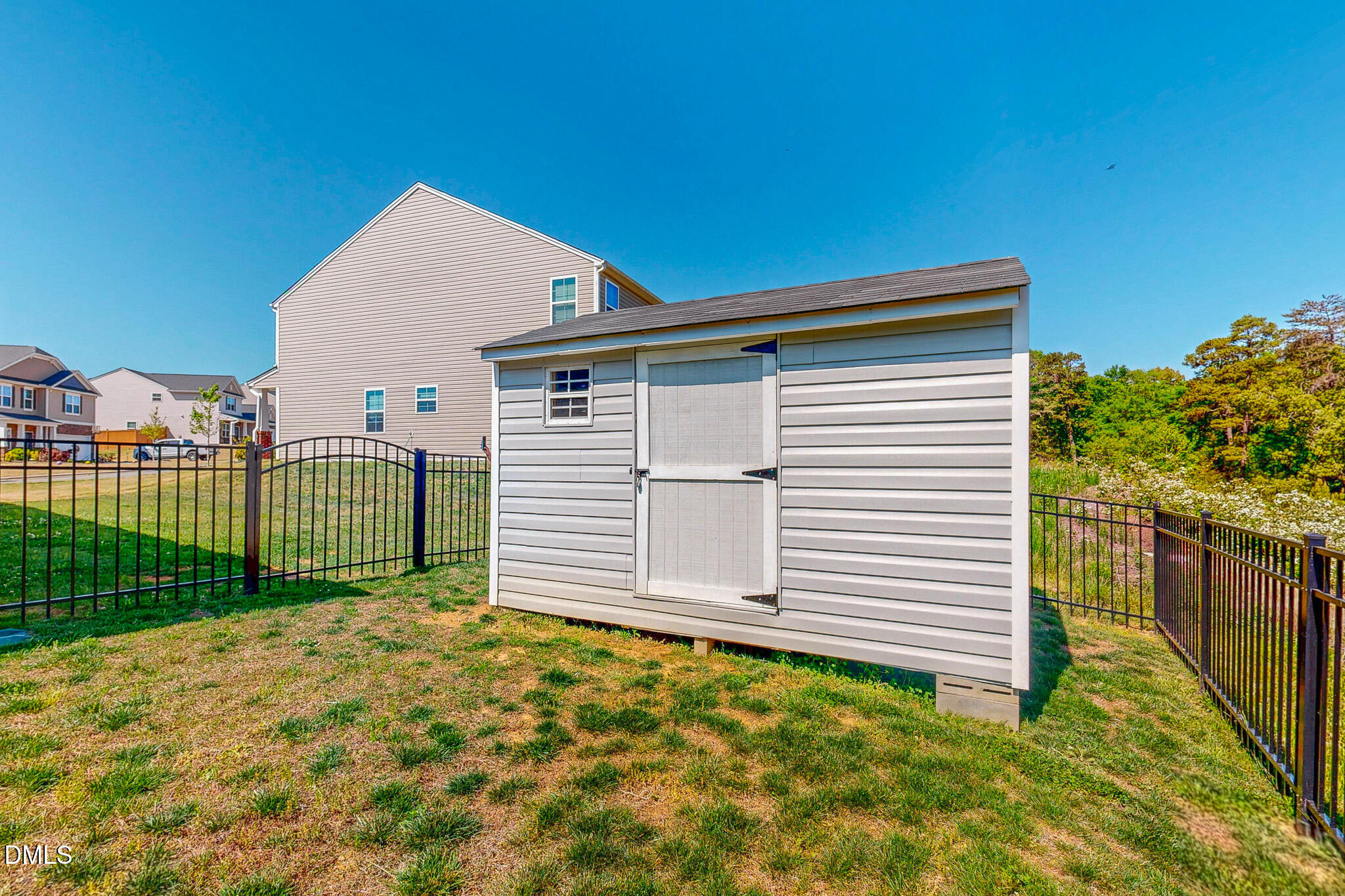 1017 Broadlands Way Graham, NC 27253 - Photo 20 of 32 a view of a house with a backyard