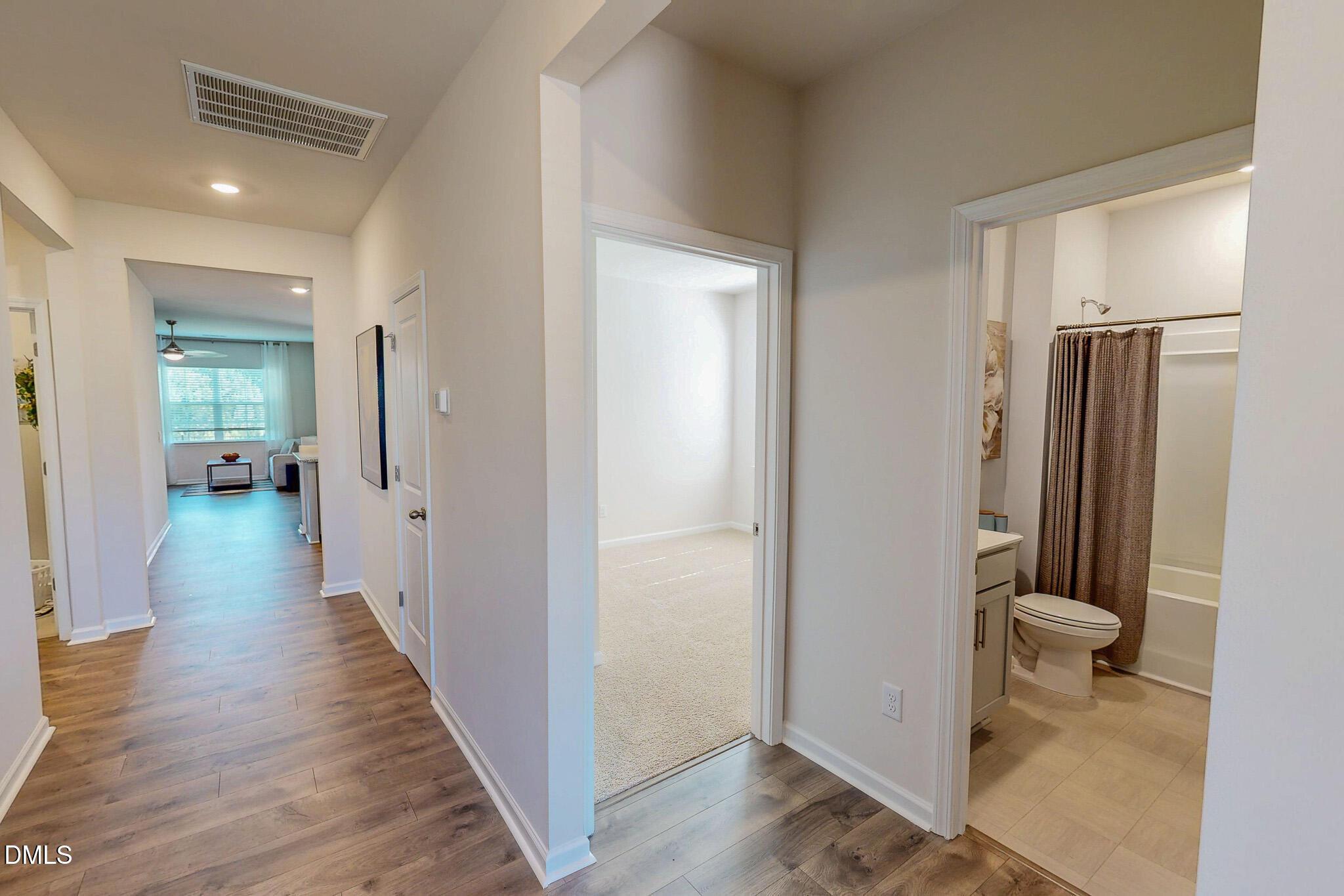 1017 Broadlands Way Graham, NC 27253 - Photo 22 of 32 a view of a bathroom from the hallway