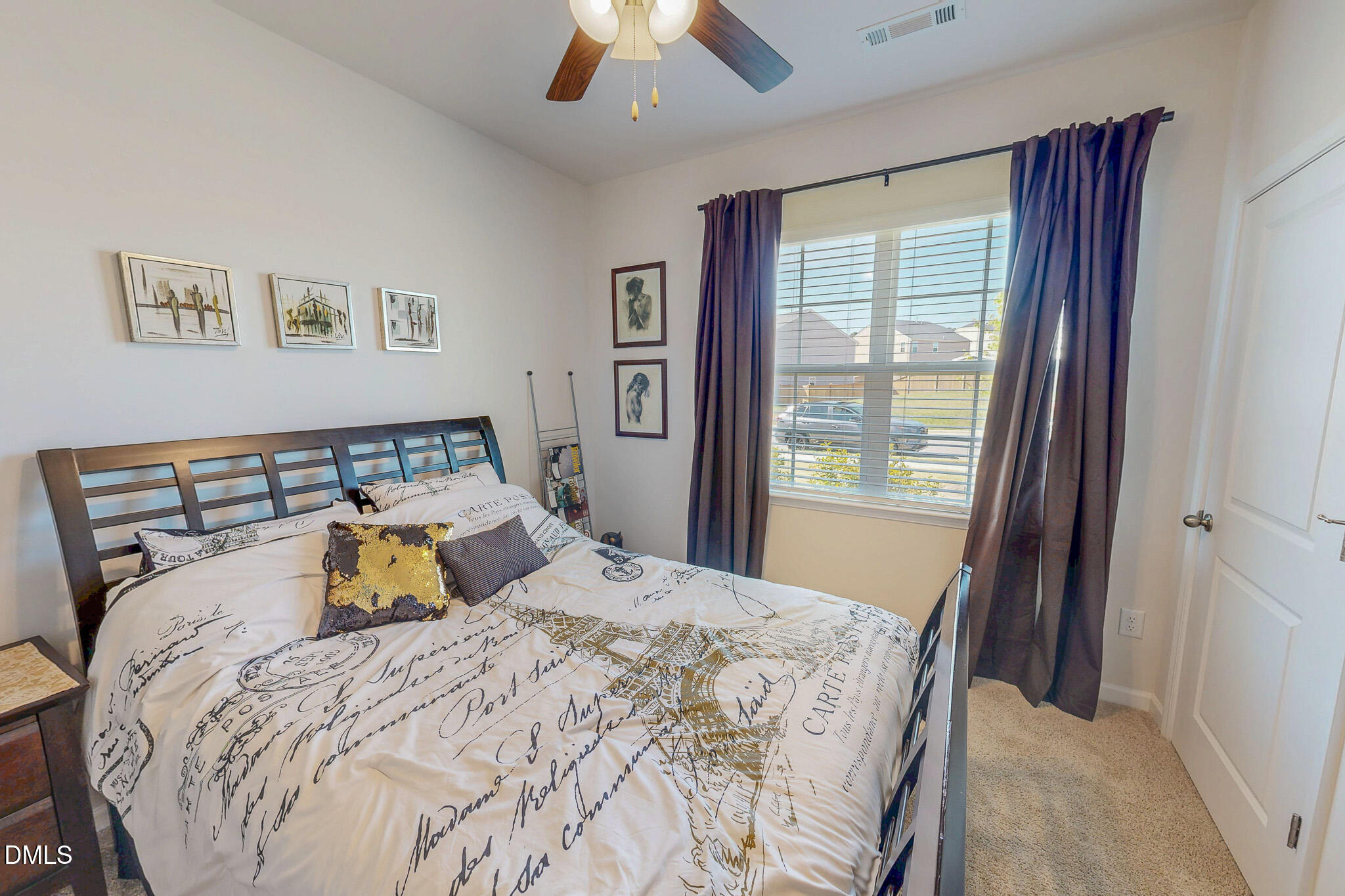 1017 Broadlands Way Graham, NC 27253 - Photo 24 of 32 a bedroom with a bed and a window