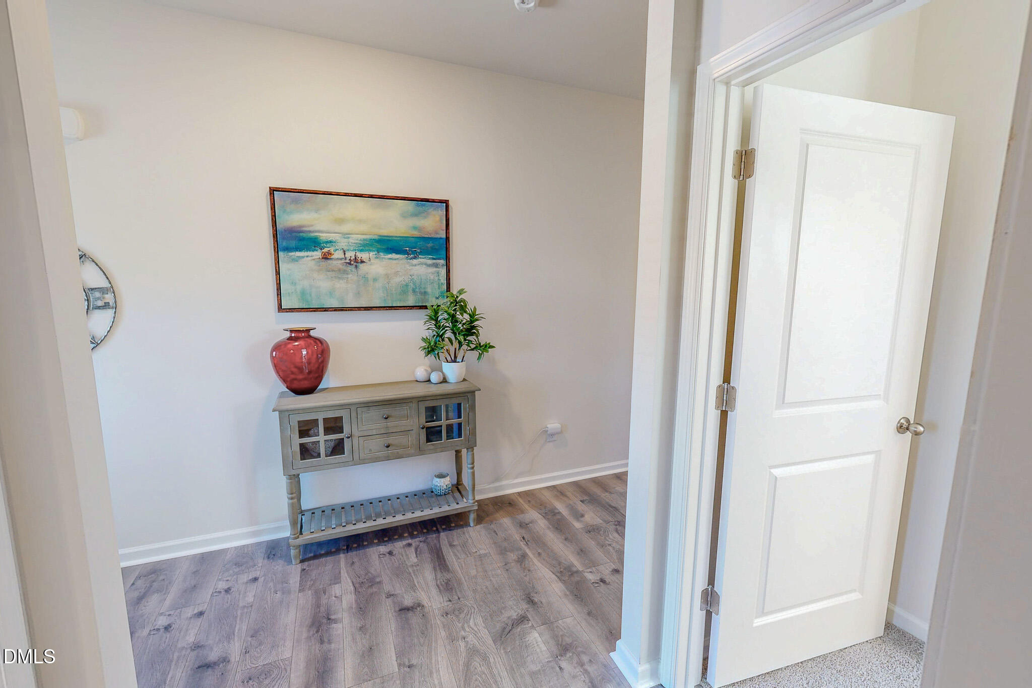 1017 Broadlands Way Graham, NC 27253 - Photo 25 of 32 a view of an entryway with painting on the wall