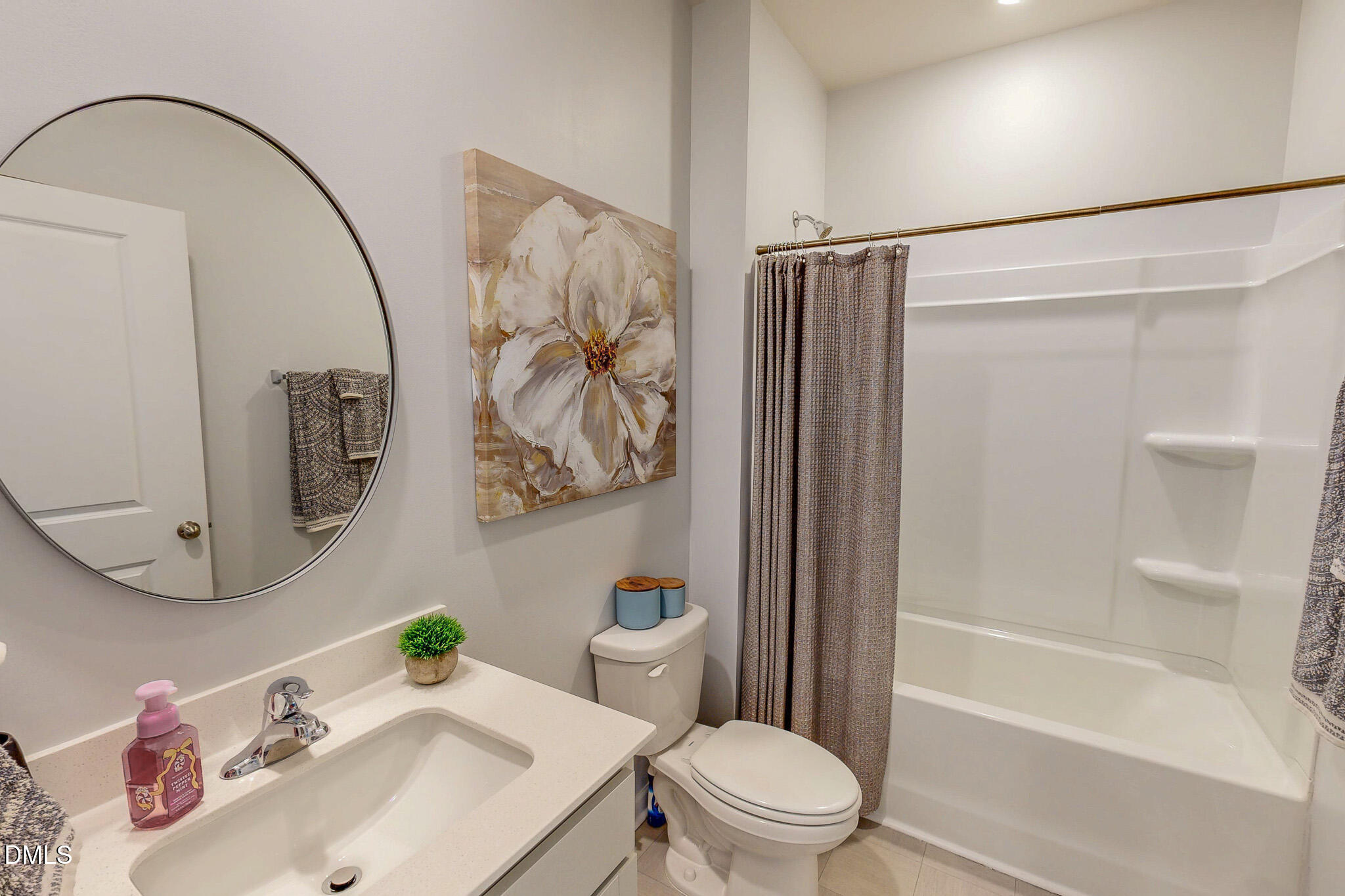 1017 Broadlands Way Graham, NC 27253 - Photo 26 of 32 a bathroom with a sink toilet and shower