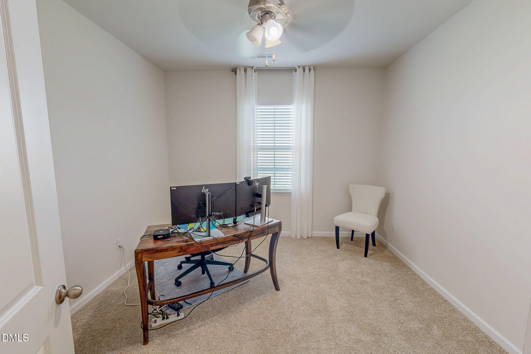 1017 Broadlands Way Graham, NC 27253 - Photo 31 of 32 a view of a workspace with furniture and a window