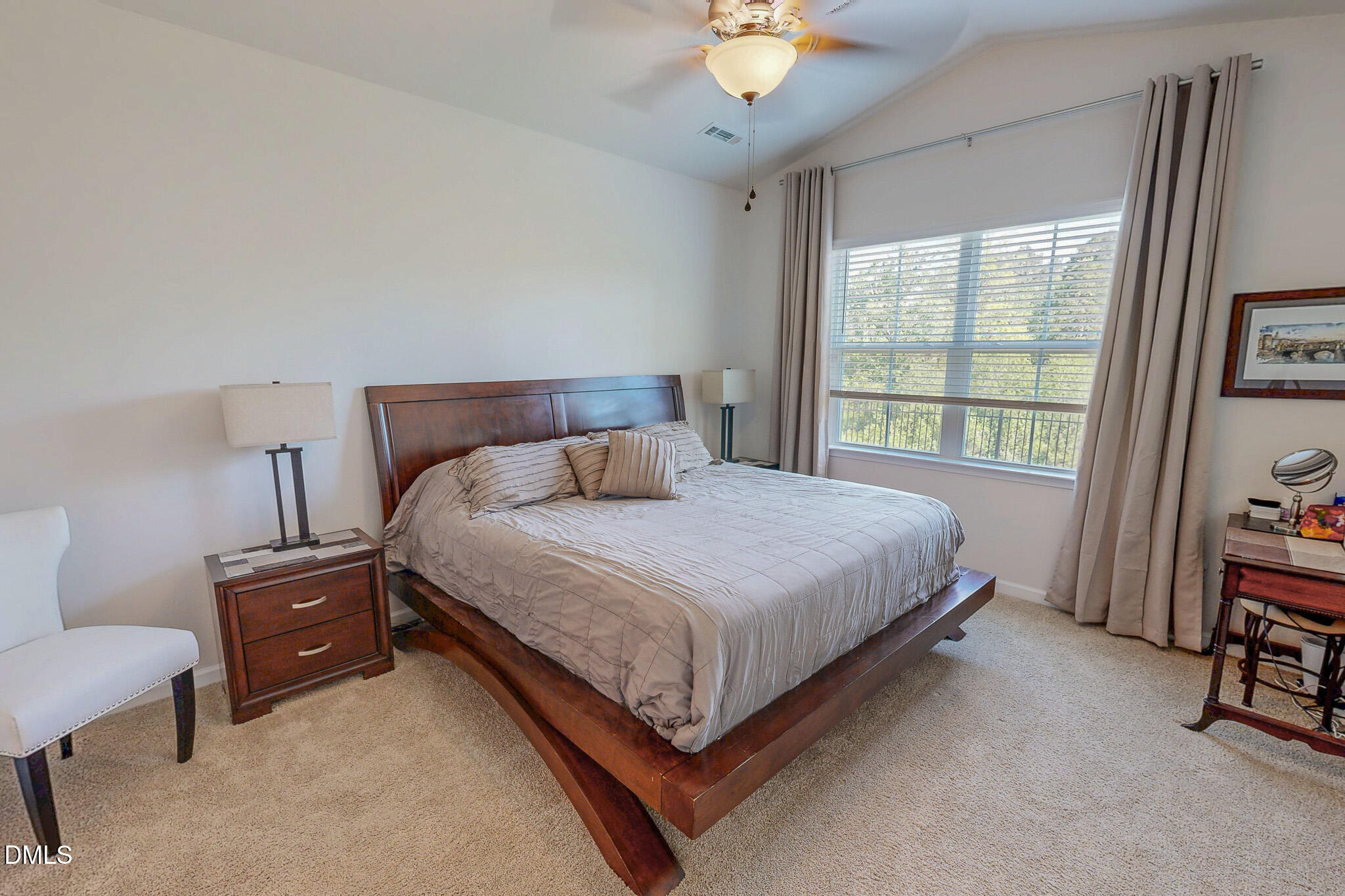 1017 Broadlands Way Graham, NC 27253 - Photo 4 of 32 a bedroom with a bed and a window