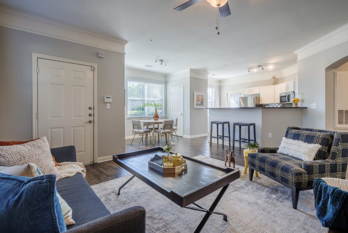 12101 Dessau Road, Unit 109 Austin, TX 78754 - Photo 14 of 20 a living room with furniture and a table