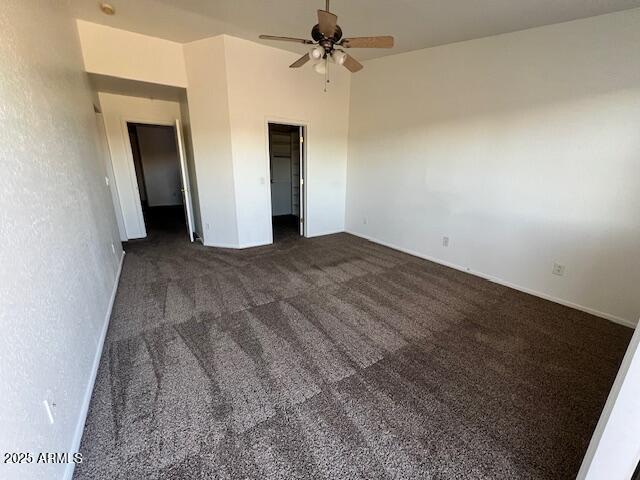 5415 East McKellips Road, Unit 31 Mesa, AZ 85215 - Photo 11 of 16 an empty room with a ceiling fan and carpet
