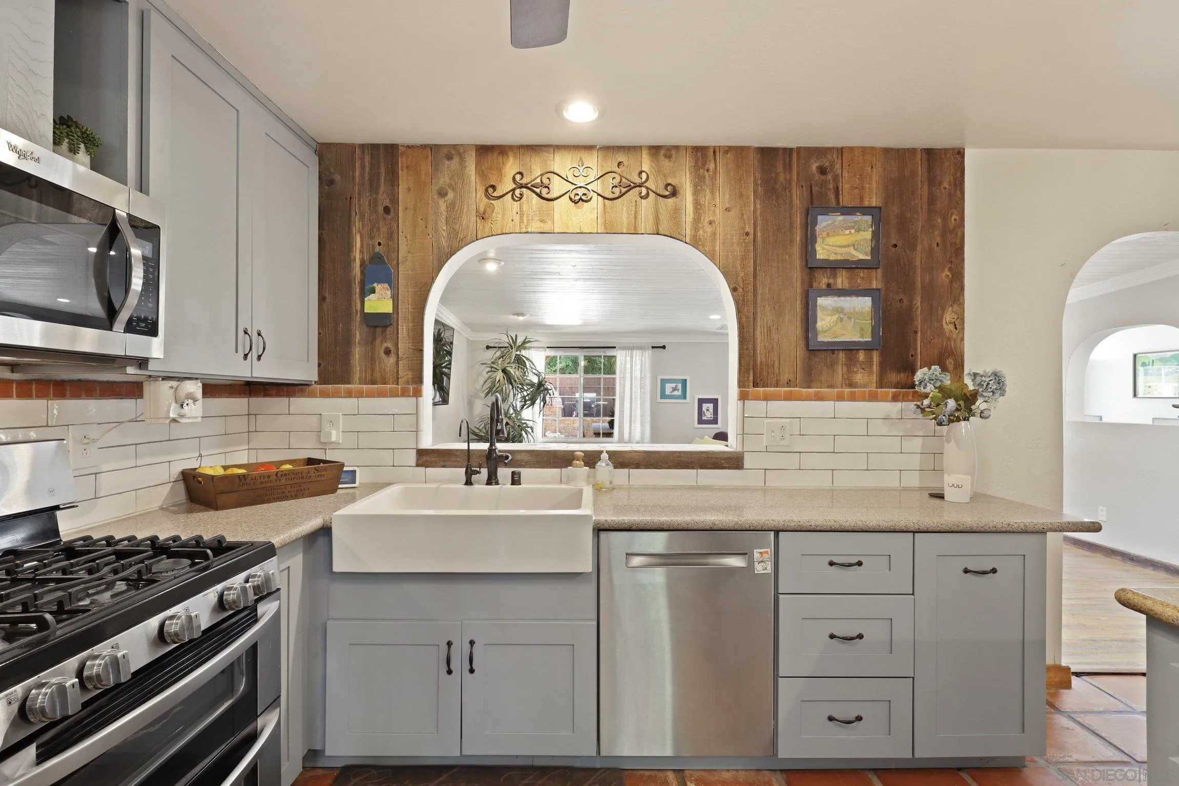 13107 Sudan Road Poway, CA 92064 - Photo 11 of 59 a kitchen with granite countertop a sink stainless steel appliances and cabinets