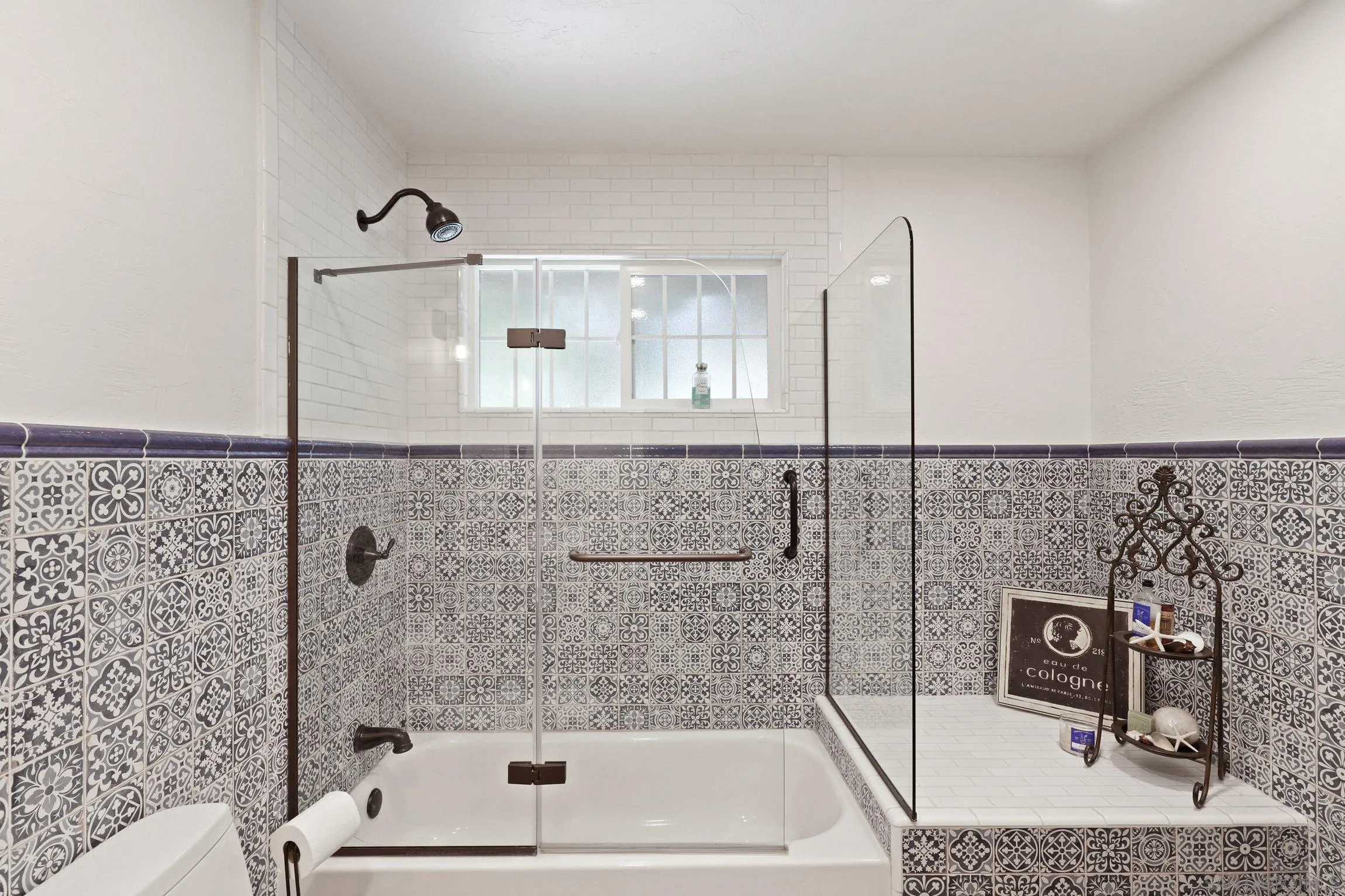 13107 Sudan Road Poway, CA 92064 - Photo 26 of 59 a bathroom with a bathtub and shower