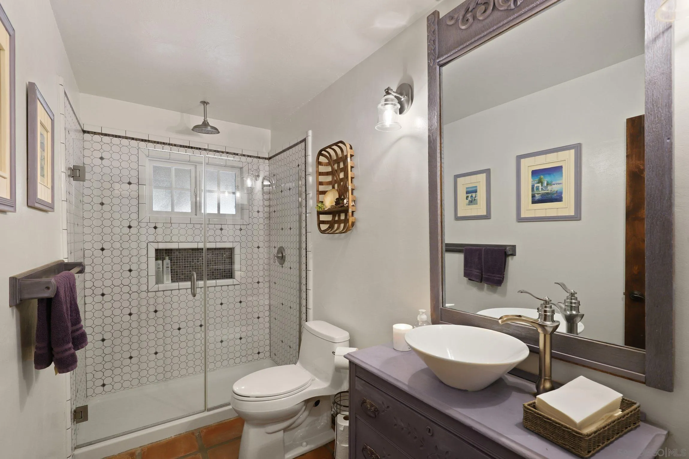 13107 Sudan Road Poway, CA 92064 - Photo 31 of 59 a bathroom with a sink a toilet and shower