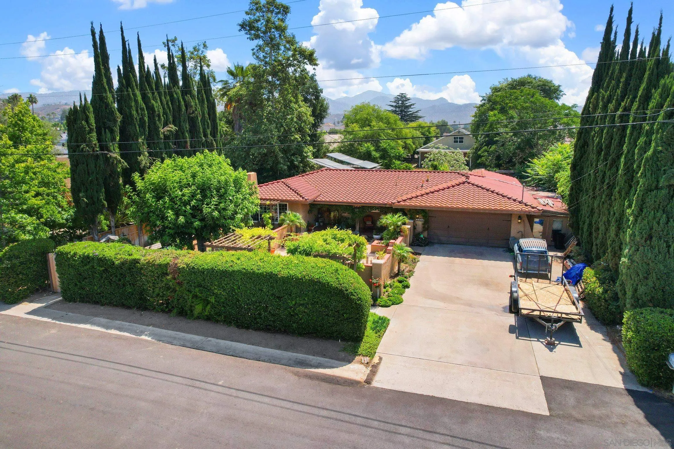13107 Sudan Road Poway, CA 92064 - Photo 53 of 59 a view of a garden with an outdoor seating