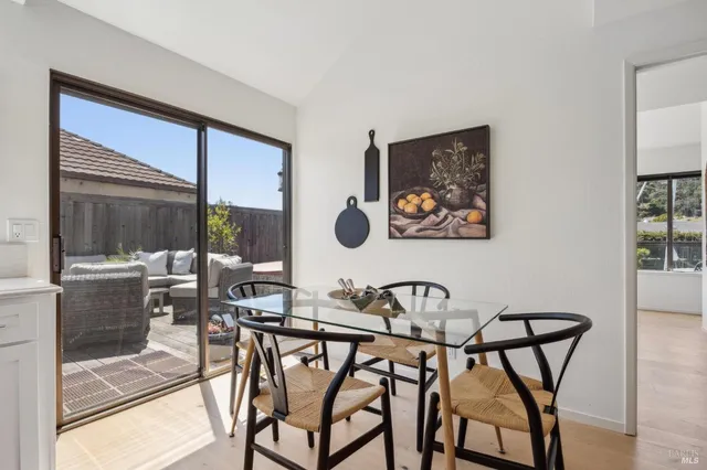 a room with a large window and couch