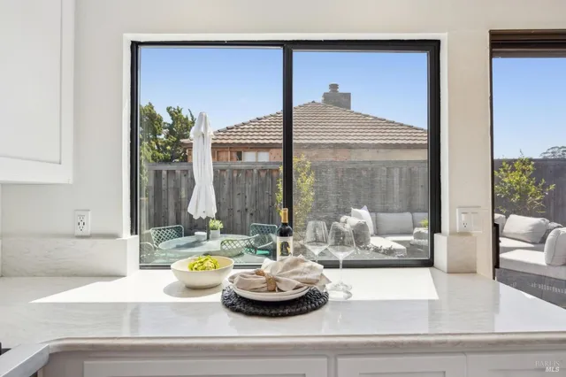 a bathroom with a glass shower door