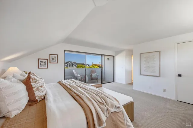 a view of a hallway with seating area