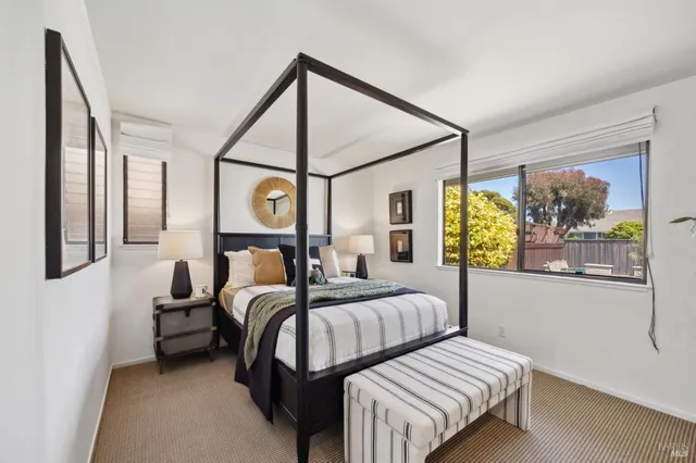 a view of a glass door with a yard from a window