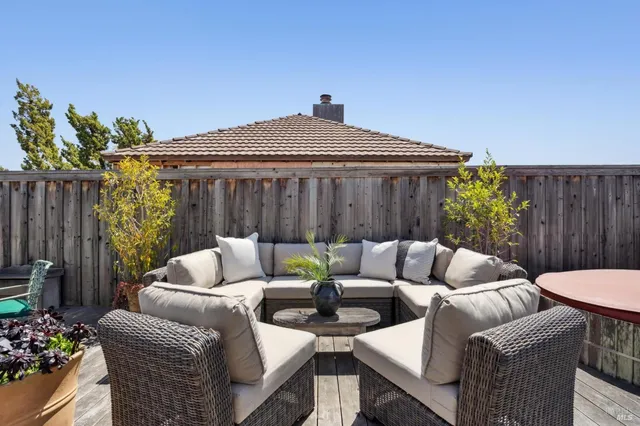 a view of a terrace with furniture