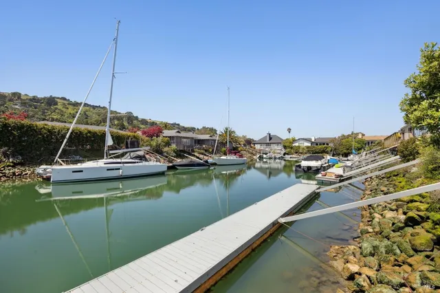 a view of a lake with a house