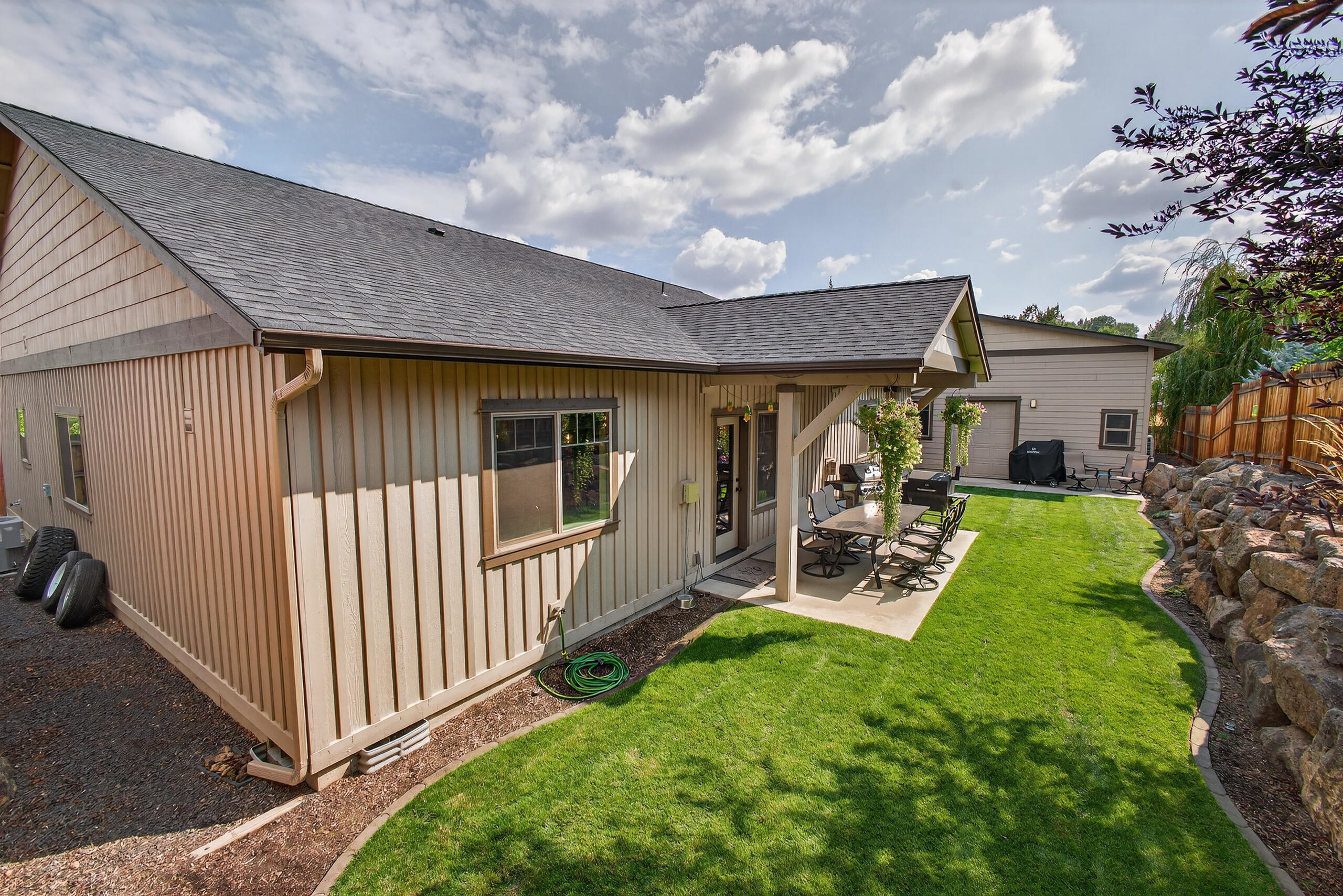 2793 Southwest 33rd Street Redmond, OR 97756 - Photo 33 of 44 a view of a house with backyard and porch