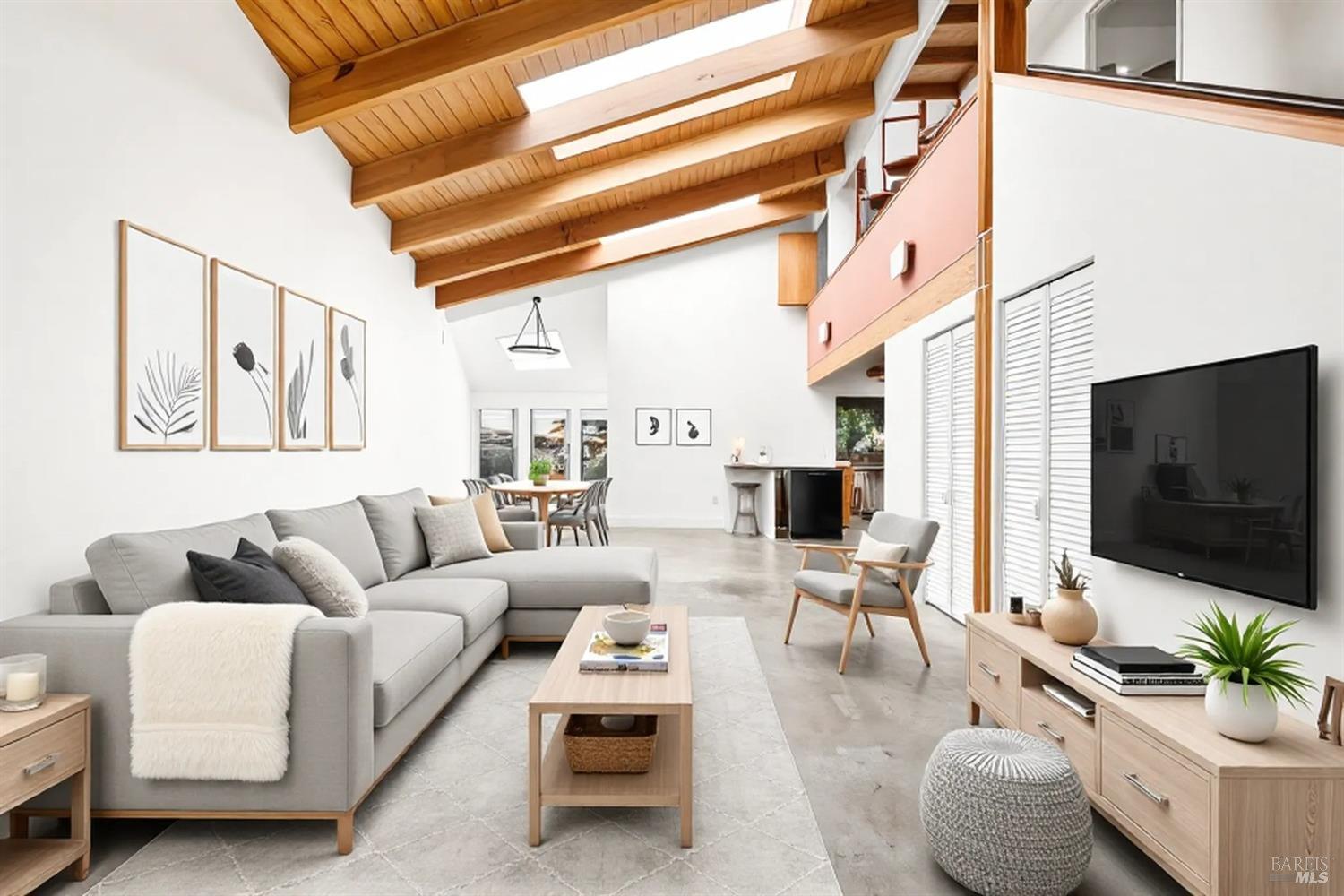 4521 Adeline Street Emeryville, CA 94608 - Photo 1 of 1 a living room with furniture and a flat screen tv