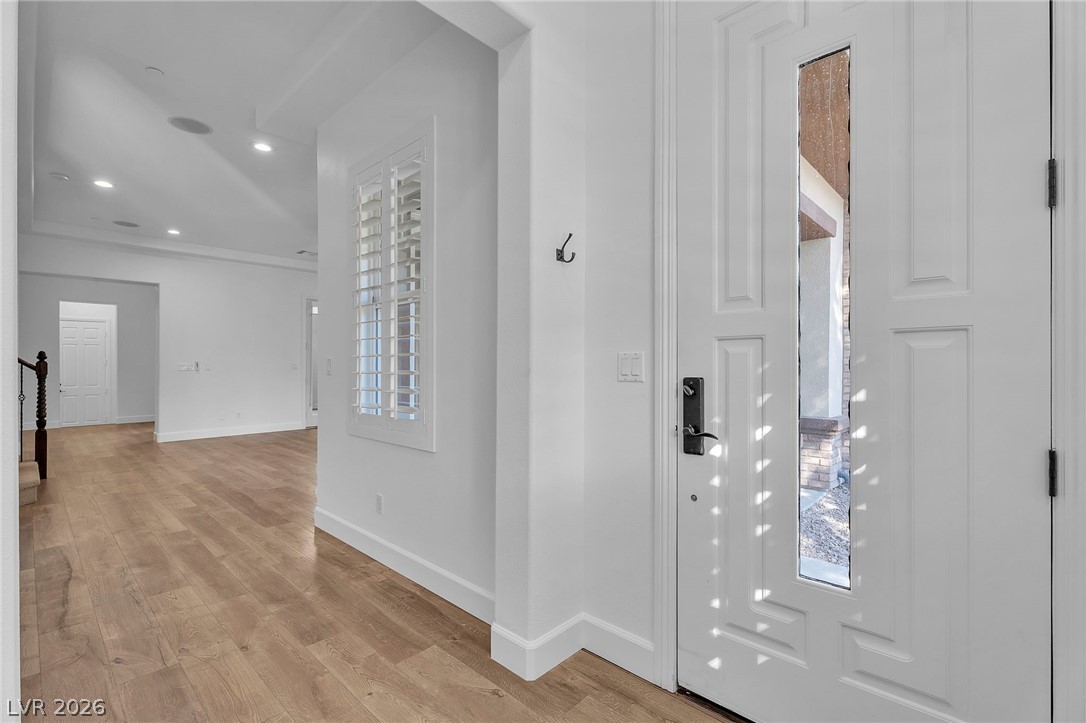 11280 Granite Ridge Drive, Unit 1037 Las Vegas, NV 89135 - Photo 11 of 51 Foyer entrance featuring recessed lighting, light wood finished floors, and healthy amount of natural light