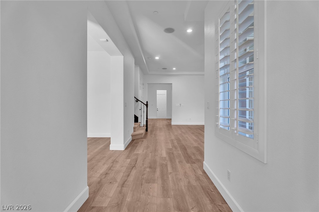 11280 Granite Ridge Drive, Unit 1037 Las Vegas, NV 89135 - Photo 12 of 51 Corridor featuring recessed lighting and light wood-type flooring