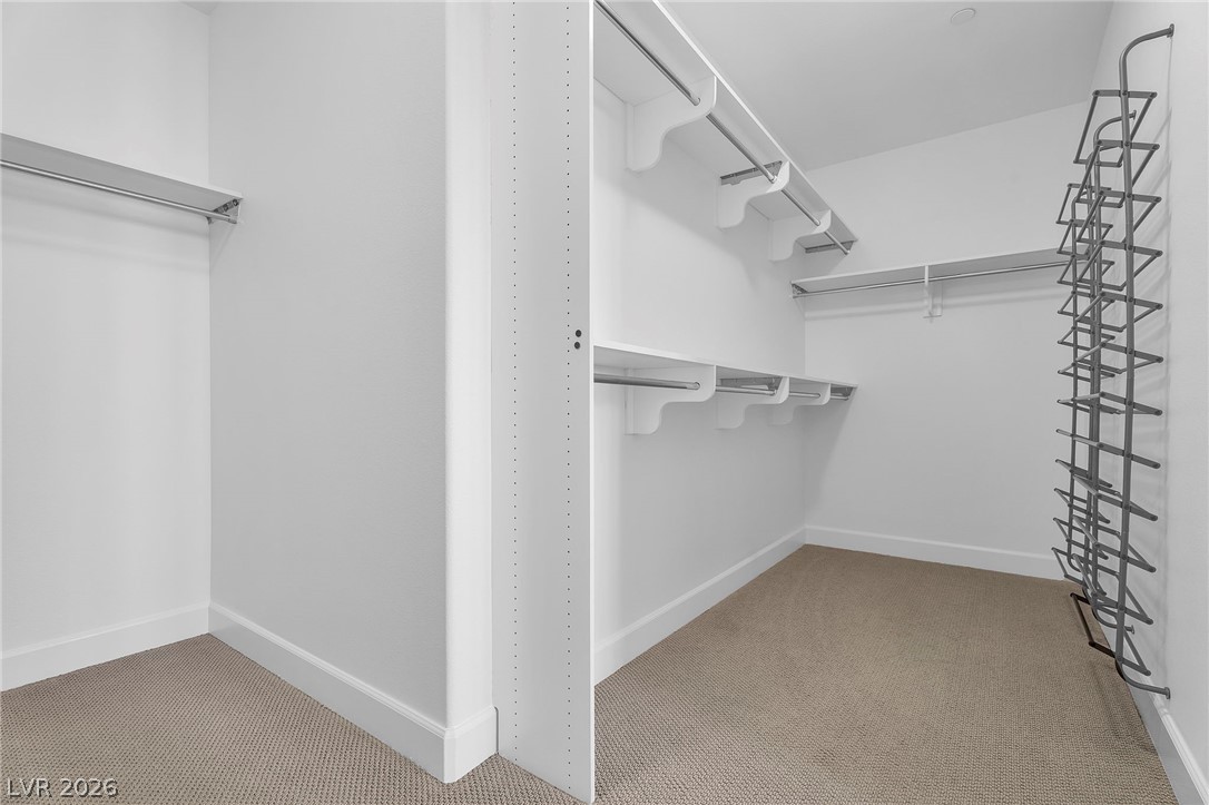 11280 Granite Ridge Drive, Unit 1037 Las Vegas, NV 89135 - Photo 29 of 51 Walk in closet master bedroom