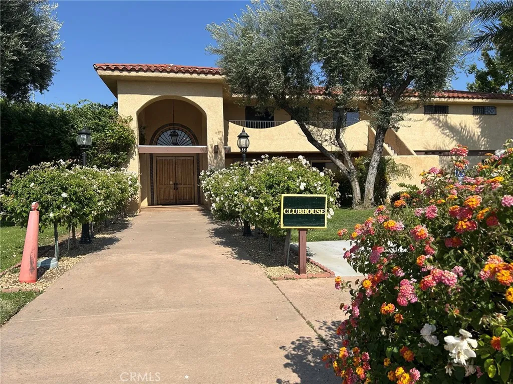 27250 Murrieta Road, Unit 347 Menifee, CA 92586 - Photo 32 of 38 a front view of a house with a yard
