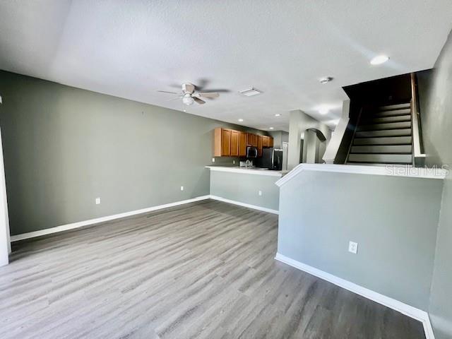 15655 Stable Run Drive Spring Hill, FL 34610 - Photo 19 of 48 wooden floor in an empty room