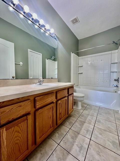 15655 Stable Run Drive Spring Hill, FL 34610 - Photo 28 of 48 a spacious bathroom with a granite countertop sink a mirror and a