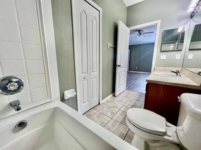 15655 Stable Run Drive Spring Hill, FL 34610 - Photo 30 of 48 a bathroom with a sink a toilet and shower