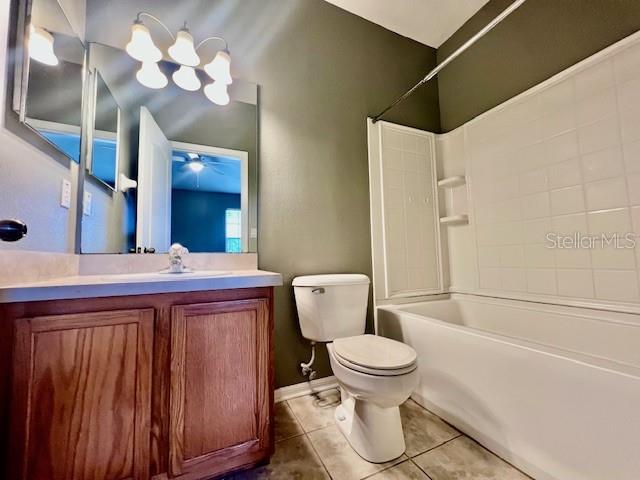 15655 Stable Run Drive Spring Hill, FL 34610 - Photo 35 of 48 a bathroom with a toilet a sink and bathtub