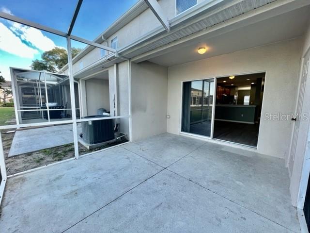 15655 Stable Run Drive Spring Hill, FL 34610 - Photo 39 of 48 an empty room with windows