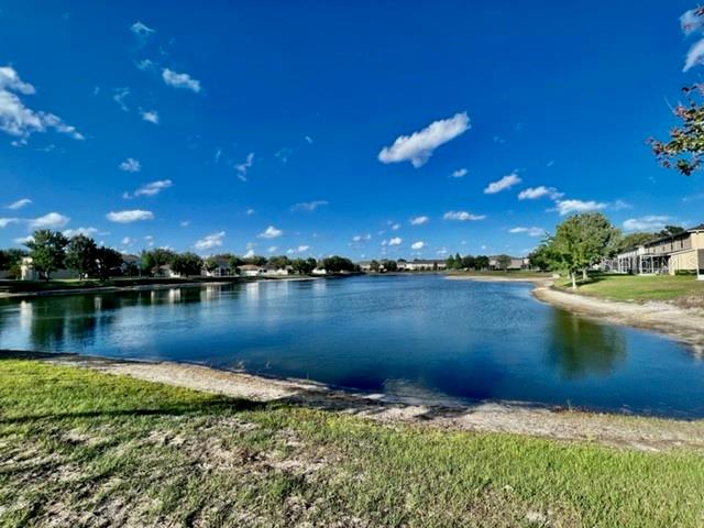 15655 Stable Run Drive Spring Hill, FL 34610 - Photo 46 of 48 a view of a lake in middle of a house