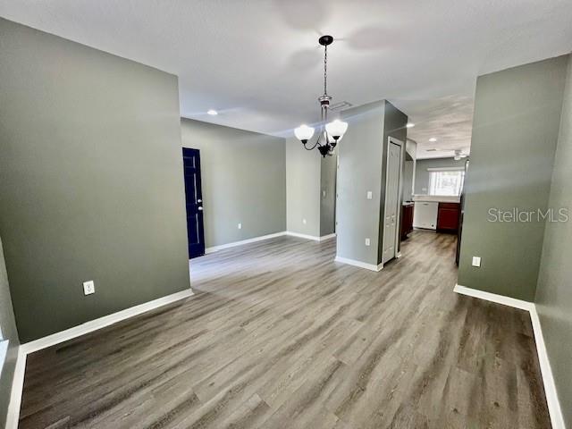 15655 Stable Run Drive Spring Hill, FL 34610 - Photo 9 of 48 a view of a livingroom with a chandelier