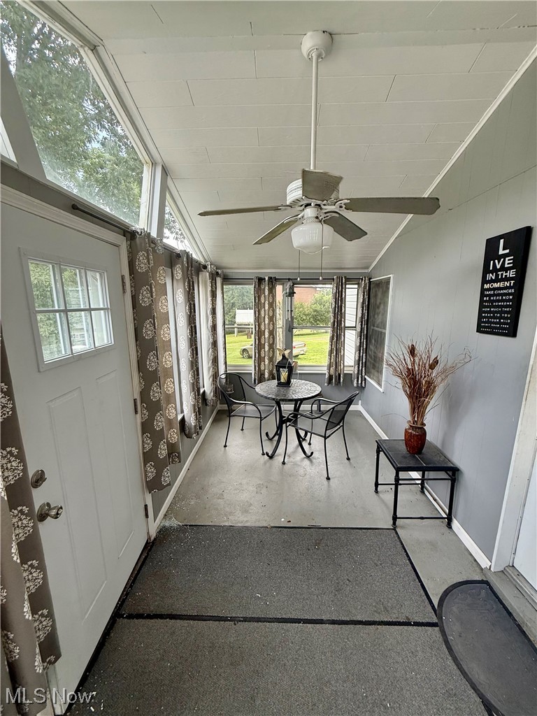 2614 Eldersville Road Follansbee, WV 26037 - Photo 5 of 18 Sunroom / solarium featuring a ceiling fan, vaulted ceiling, and healthy amount of natural light