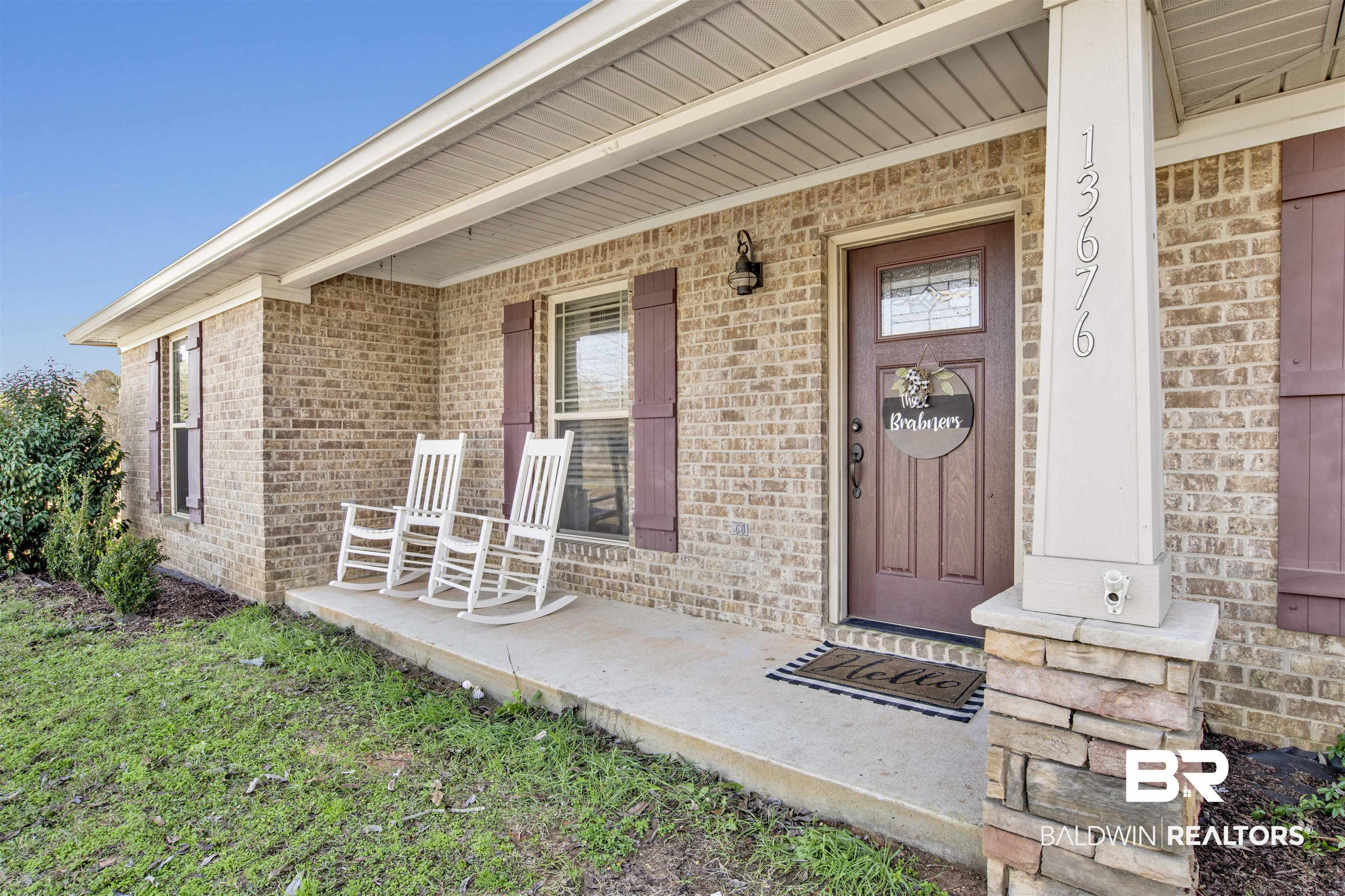 13676 Styx River Road Stapleton, AL 36578 - Photo 4 of 30 View of exterior entry featuring a porch