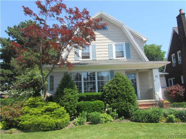 12 Coolidge Road Buffalo, NY 14220 - Photo 1 of 1 Exterior Front ATTRACTIVE DUTCH COLONIAL WITH LUSH