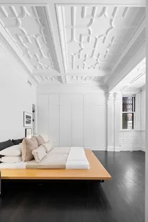 a room with furniture and window