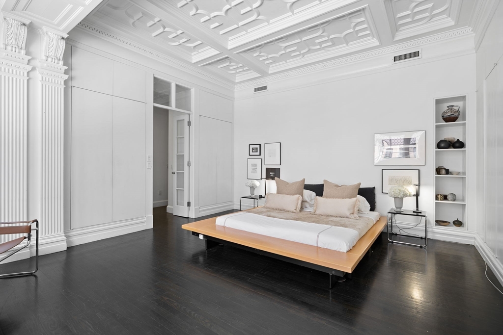 175 Commonwealth Avenue, Unit B Boston, MA 02116 - Photo 12 of 25 a large white bed in a white room